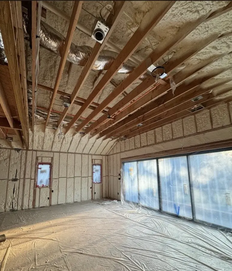 Interior walls and ceiling insulated with spray foam during new construction in Bothell